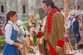 Luke Evans flirts with Emma Watson in new “Beauty and the Beast” pic