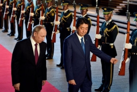 Abe, Putin hold second meeting with little to show on isles row