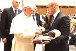 Arthur Abraham gifts Pope Francis with his own boxing gloves