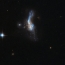 Astronomers find merging dwarf galaxies to back collision theory
