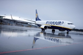 Ryanair profits slide as fares drop