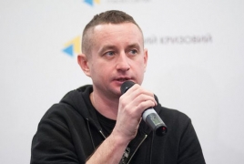 Prominent Ukrainian author seized in Belarus, ordered to leave