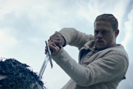 Charlie Hunnam faces his destiny in 'King Arthur” trailer