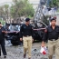 Seven dead at Pakistan court as three suicide bombers attack