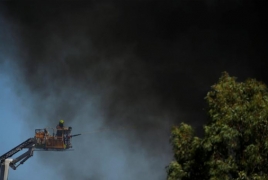 Firefighters battle massive factory fire in Sydney