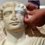 Damaged Palmyra busts back in Syria after restoration in Italy