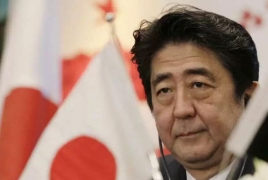 Support for Japan PM dives in wake of school scandal: online poll