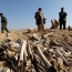Iraq paramilitary forces say mass grave of hundreds found