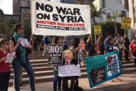 В США сотни тысяч человек вышли на акции протеста против ракетного удара по Сирии