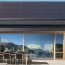 Tesla unveils “sleek and low-profile” solar panel made by Panasonic
