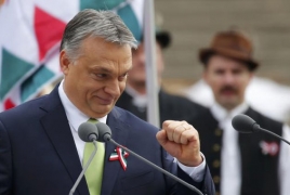 Hungary's Orban sets stakes for 2018 election as protests persist