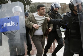 Azeri authorities use jail, militia to snuff out protest movement