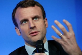 French presidential hopeful Macron heckled by pro-Le Pen workers