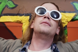 Macaulay Culkin as Kurt Cobain in Father John Misty's music vid