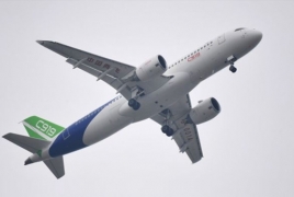 First Chinese-built passenger jet takes off for maiden flight