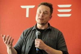 Musk thinks automated software will make Tesla worth as much as Apple