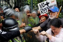 Elderly Venezuelans clash with police in opposition march