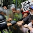 Elderly Venezuelans clash with police in opposition march
