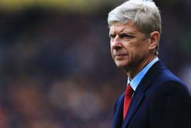 Arsenal manager Arsene Wenger signs two-year deal at the club