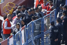 Greek police evacuate Athens migrant camp