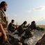 U.S.-backed Kurds enter IS-held Raqa from east: commander