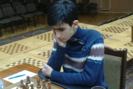 Шахматист Арман Микаелян на 13-м месте после 8 туров ЧЕ