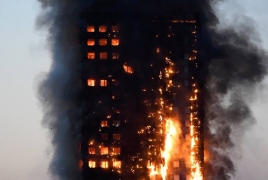 Fire engulfs tower block in London, reportedly claims lives