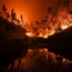 Raging Portugal wildfire kills at least 62