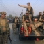 Pakistan twin blasts leave 61 dead