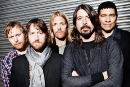 Foo Fighters premiere a new song, “Dirty Water” in Paris