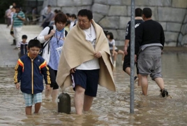 Japan floods force hundreds of thousands to leave homes