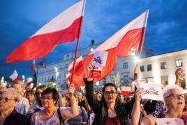 Polish president vetoes judicial reforms after nationwide protests