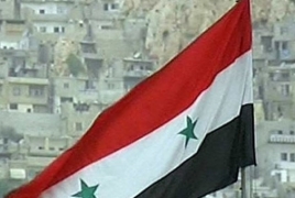 Assad troops liberate new town in Syria's Homs