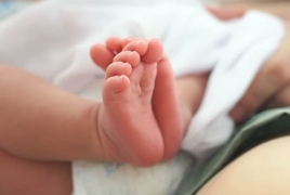 Baby born in China four years after parents' death