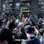Clashes between police and protesters in Yerevan; the crowd tries to move up the street to parliament