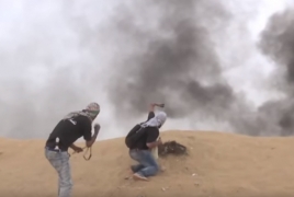 Palestinian protesters shoot down Israeli drone with stones