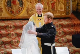 Prince Harry and Meghan Markle proclaimed husband and wife