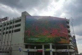 Promotional tourism videos about Armenia rolling on Moscow buildings