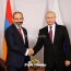 Armenia PM heading to FIFA opening; Putin meeting on agenda