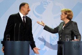 «Репортеры без границ» призвали Меркель потребовать у Алиева освободить журналистов в Азербайджане