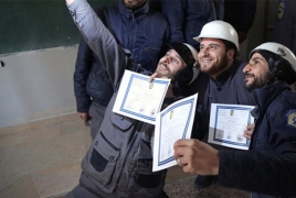 100 White Helmet members granted asylum in UK