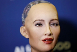Sophia the robot communicating with Francophonie Forum attendees