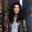 Cher says writing a book about herself, hints at movie for later