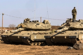 Israeli tank rolls across highway as crew falls asleep inside