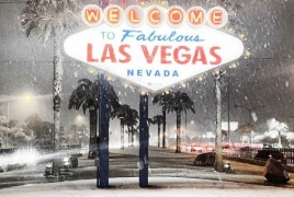Rare snowfall stuns visitors in Las Vegas