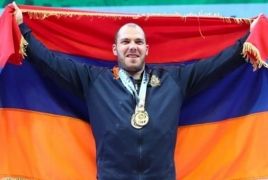 Armenian weightlifter sets world record, takes gold