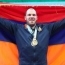 Armenian weightlifter sets world record, takes gold