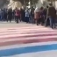 Tehran students refuse to walk on U.S., Israeli flags