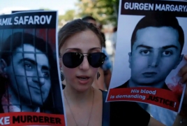 The Guardian. Relatives of Armenian axed to death by Azeri officer want justice