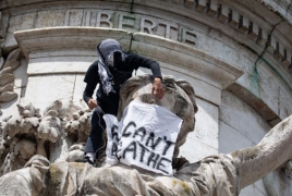 France won't take down statues, says Macron